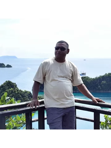 SUMBOUW S. SUNDOY, S.Pd.K, M.Pd.